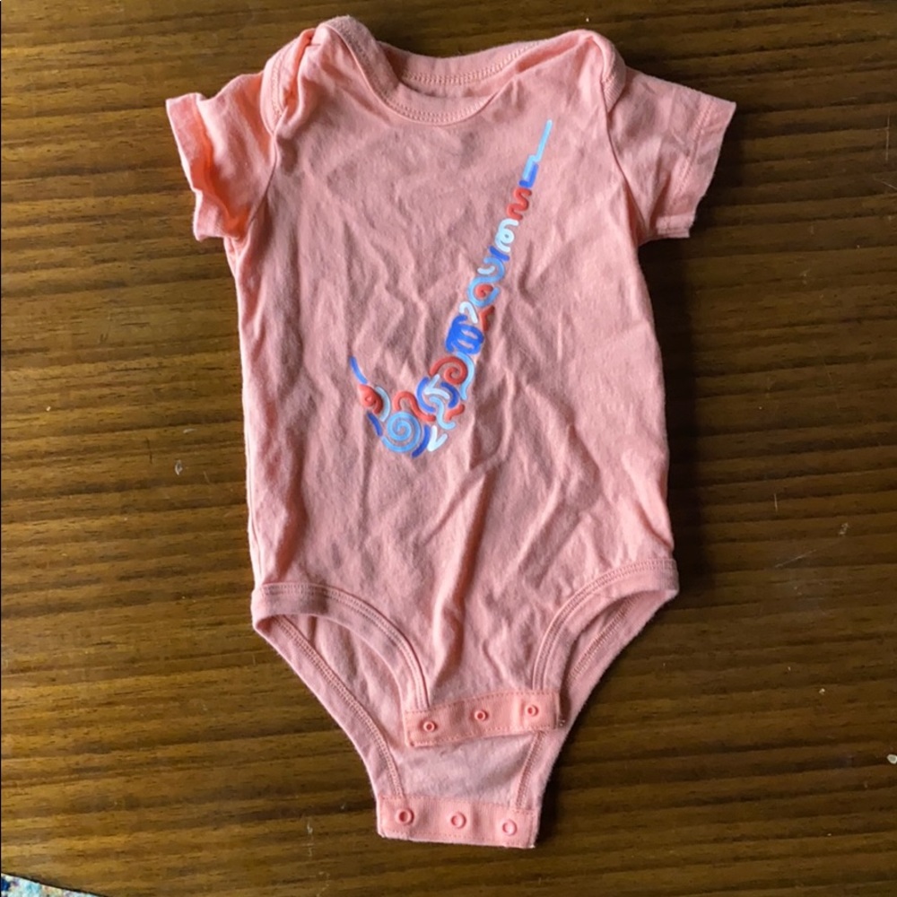 Pink nike onesie
